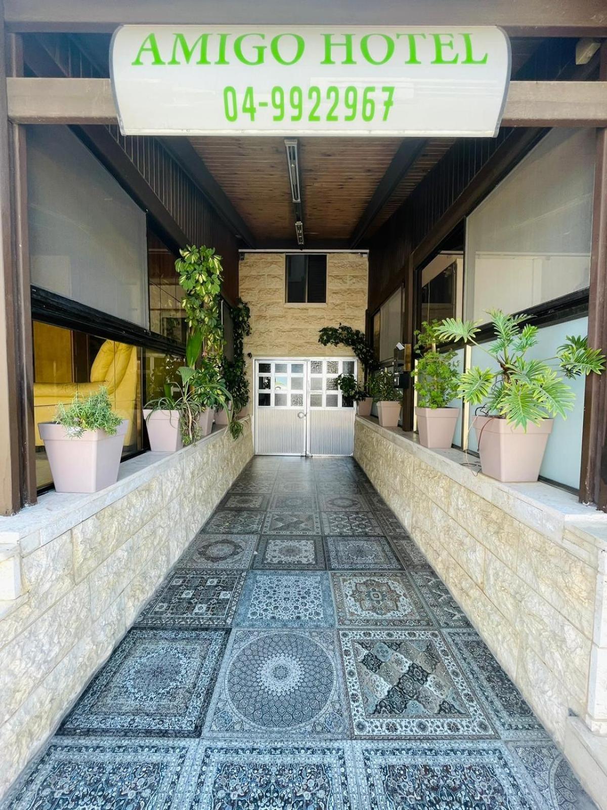 Amigo Hotel On The Beach Nahariya Exterior foto